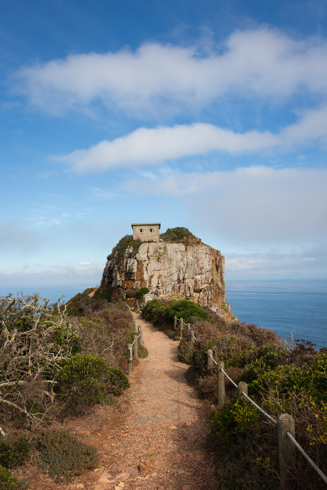 An old stone lookout on a rocky headland above the ocean at Cape Point